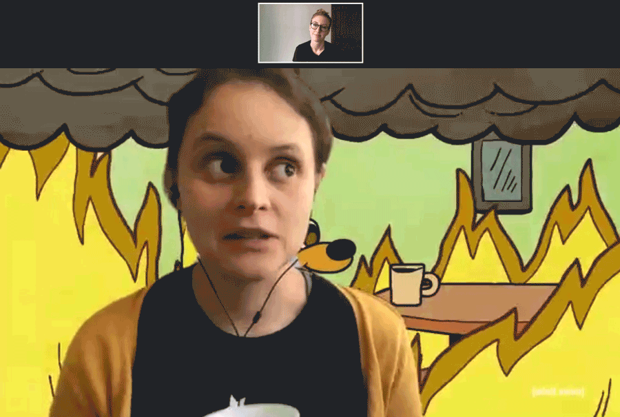 A picture of Mari Gil on a Zoom conference with Megan King demonstrating the "Everything is fine meme" virtual background.